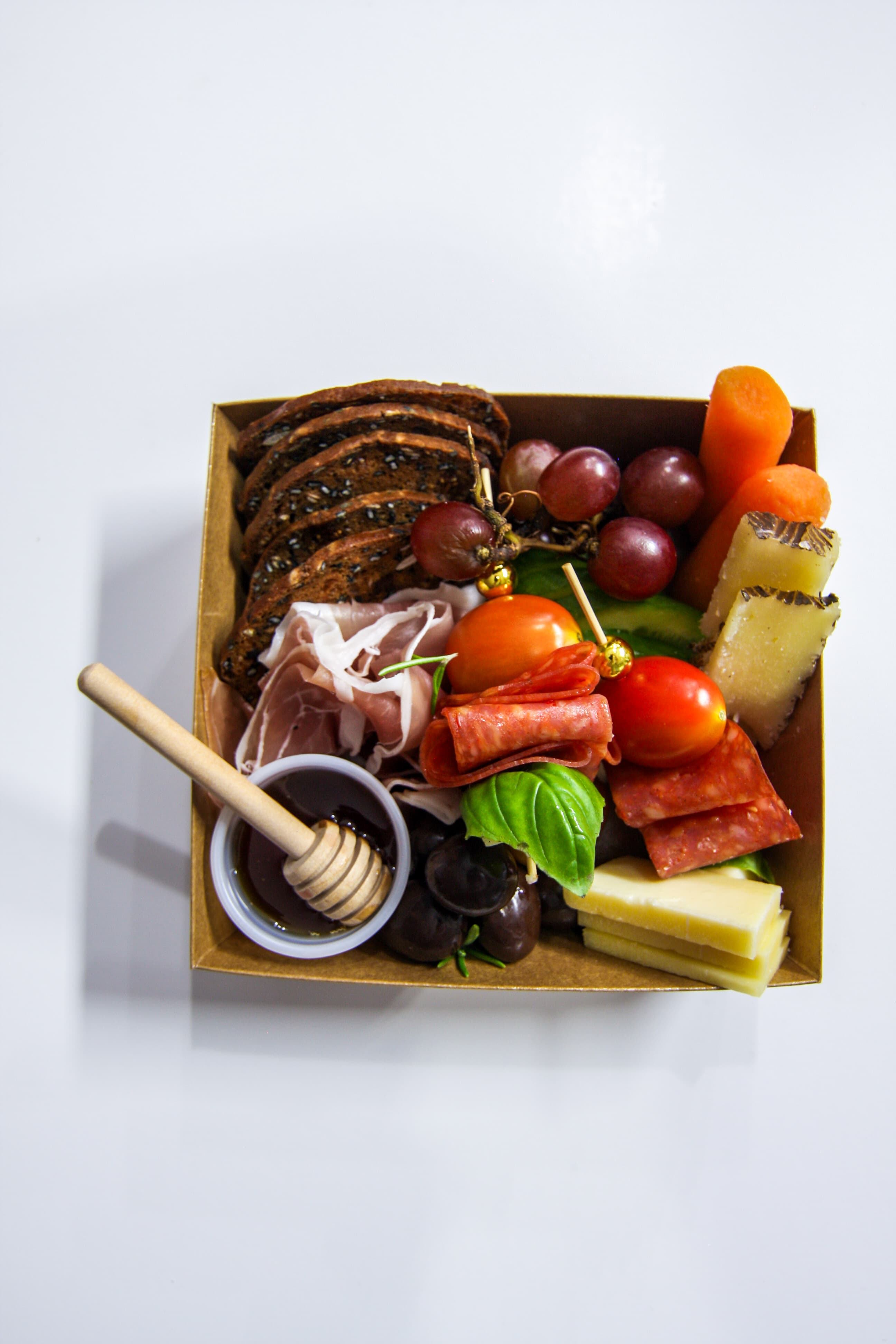 Guests enjoying charcuterie creations at an event